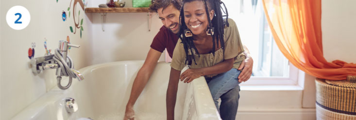 Couple preparing a bath